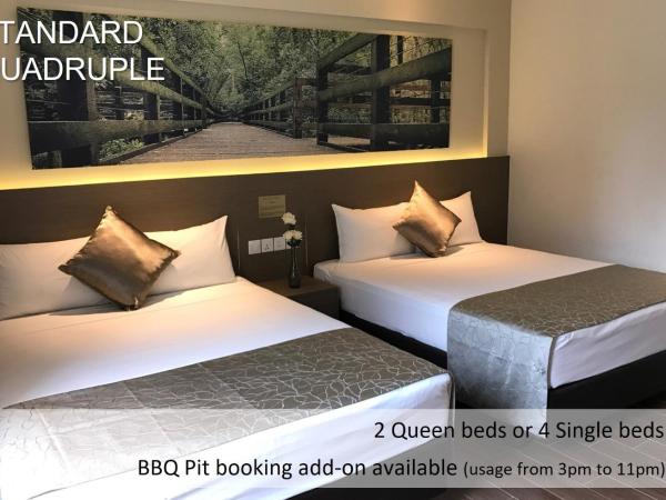 D'Resort @ Downtown East : photo 1 de la chambre chambre quadruple standard