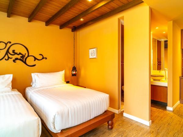 Amber Boutique Silom : photo 3 de la chambre chambre lits jumeaux d'angle