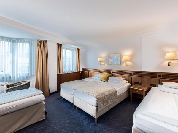 Hotel Mondschein : photo 2 de la chambre chambre triple deluxe