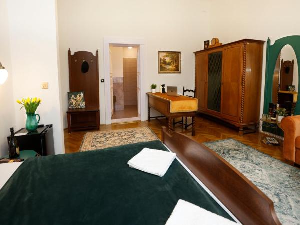 Villabaroque_Eger : photo 6 de la chambre chambre familiale