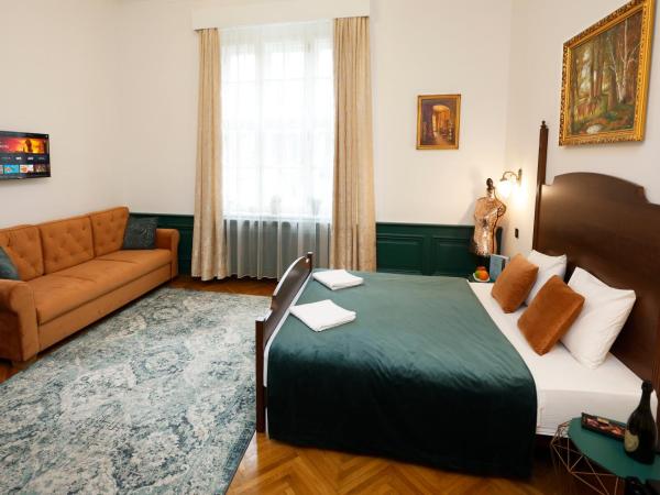 Villabaroque_Eger : photo 3 de la chambre chambre familiale