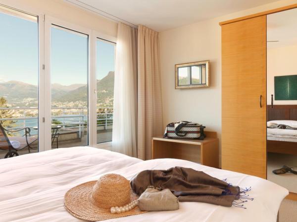 Suitenhotel Parco Paradiso : photo 6 de la chambre suite penthouse - vue sur lac