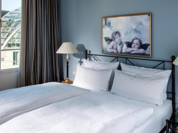 Hotel Elbflorenz Dresden : photo 1 de la chambre chambre double ou lits jumeaux