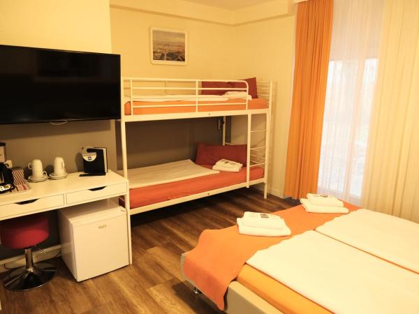 City Guesthouse Pension Berlin : photo 2 de la chambre chambre familiale