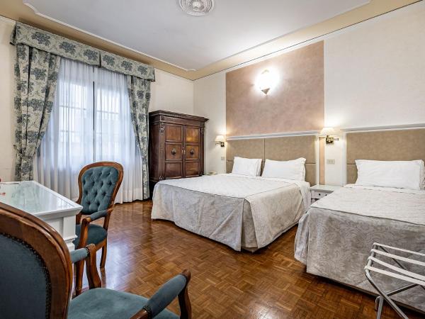 Hotel Alessandra : photo 7 de la chambre chambre triple