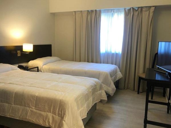 Hotel La Perla : photo 2 de la chambre chambre lits jumeaux/double