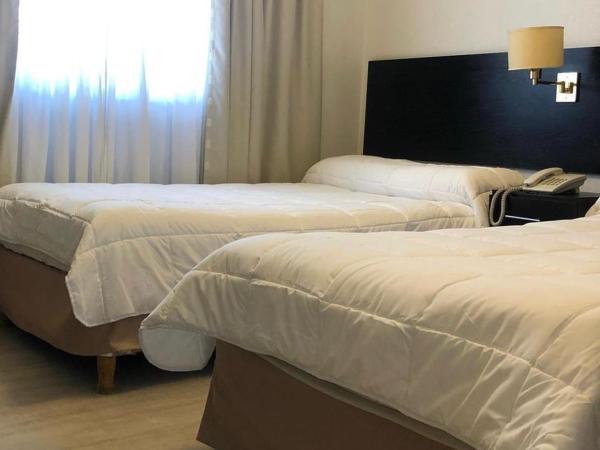 Hotel La Perla : photo 3 de la chambre chambre lits jumeaux/double