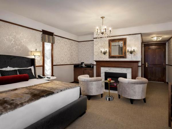 Abigail's Hotel : photo 1 de la chambre chambre lit king-size avec baignoire spa