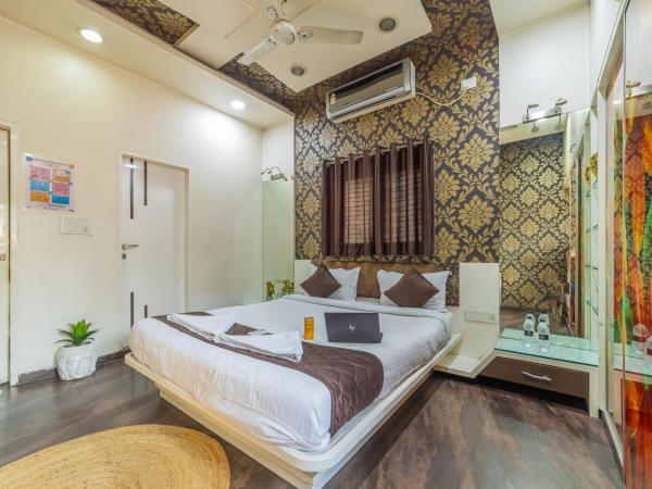 Coliwo Deux - Chandan Nagar : photo 1 de la chambre chambre lit king-size deluxe