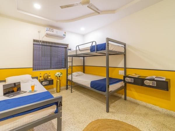 Coliwo Deux - Chandan Nagar : photo 4 de la chambre lit simple dans dortoir mixte