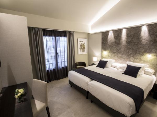 Vincci Mercat : photo 1 de la chambre chambre double ou lits jumeaux avec parking