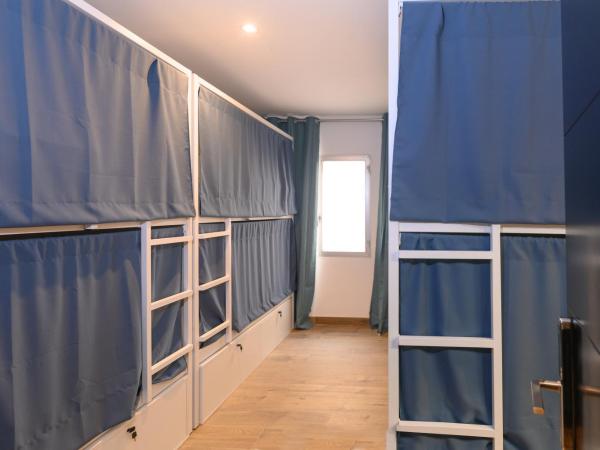 VAD HOSTEL ALICANTE - Youth Hostel age limit 18-50 : photo 2 de la chambre lit dans un dortoir mixte de 16 lits
