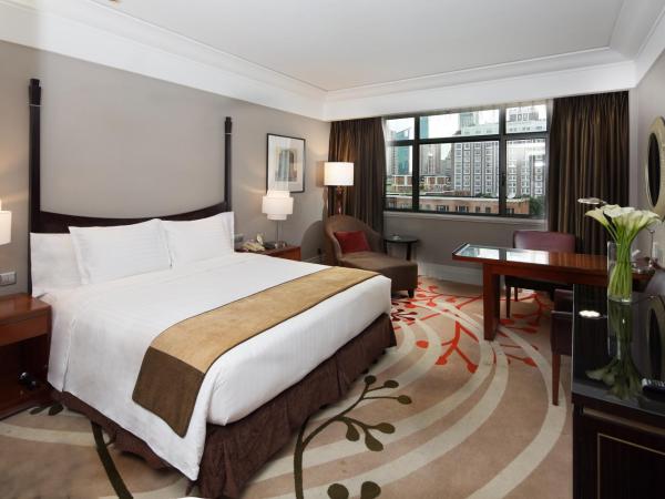 Jin Jiang Hotel : photo 3 de la chambre grande chambre deluxe lit king-size - cathay garden