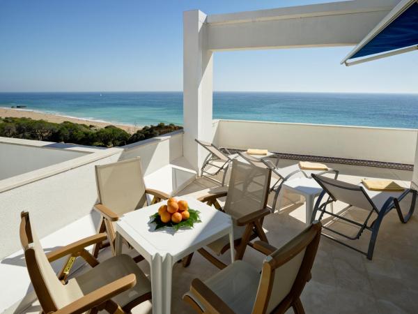Alisios : photo 8 de la chambre suite de luxe - vue sur mer (4 adultes)