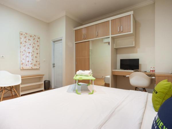 Urbanview Hotel Jagakarsa by RedDoorz : photo 4 de la chambre chambre deluxe