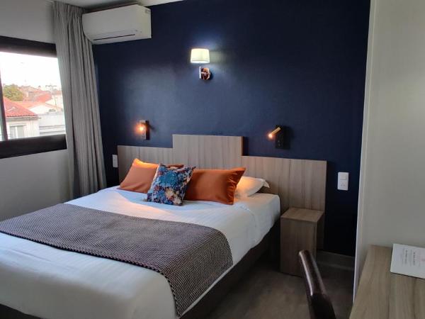 Logis Hôtel Les Bleuets : photo 2 de la chambre chambre double standard côté jardin