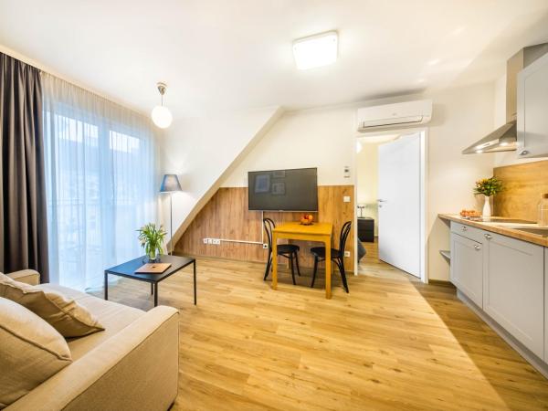 Jimmy's Apartments Lory : photo 2 de la chambre hébergement exécutif 1 chambre avec balcon