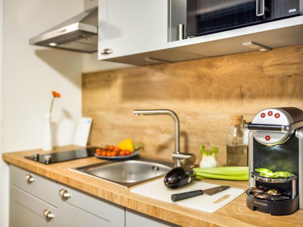 Jimmy's Apartments Lory : photo 6 de la chambre suite 1 chambre avec balcon