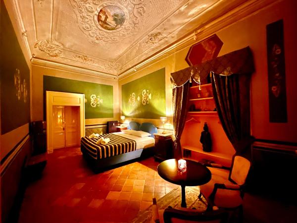 Casa Santangelo Suites : photo 9 de la chambre chambre double familiale
