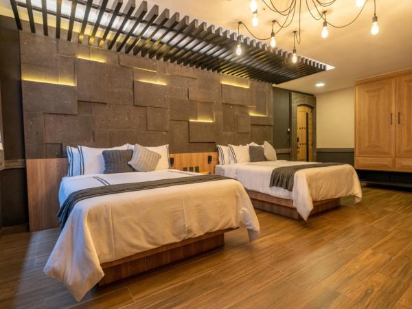 Hotel Patio Santiago : photo 2 de la chambre chambre deluxe avec 2 lits doubles