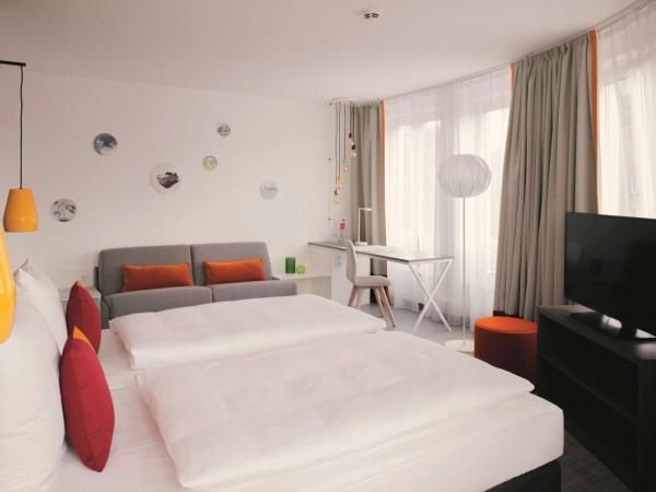 Vienna House Easy by Wyndham Leipzig : photo 7 de la chambre chambre confort plus
