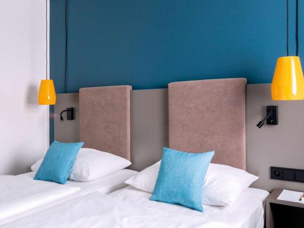 Vienna House Easy by Wyndham Cracow : photo 1 de la chambre chambre confort 