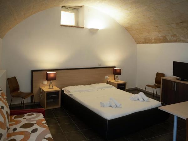 Residence Le Vie Del Mosto : photo 5 de la chambre chambre triple supérieure