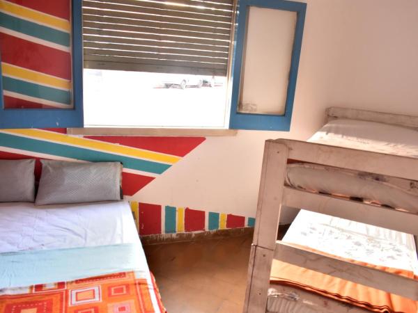 Hostel Joven casa Reggae : photo 4 de la chambre chambre quadruple avec salle de bains