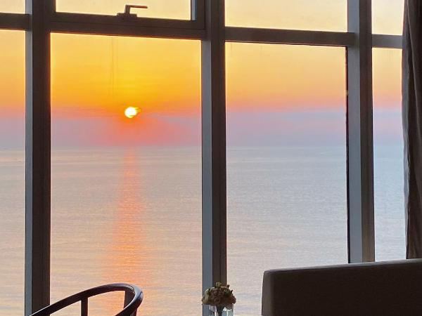 Hyatt Regency Qingdao : photo 3 de la chambre chambre lit king-size deluxe - vue sur océan