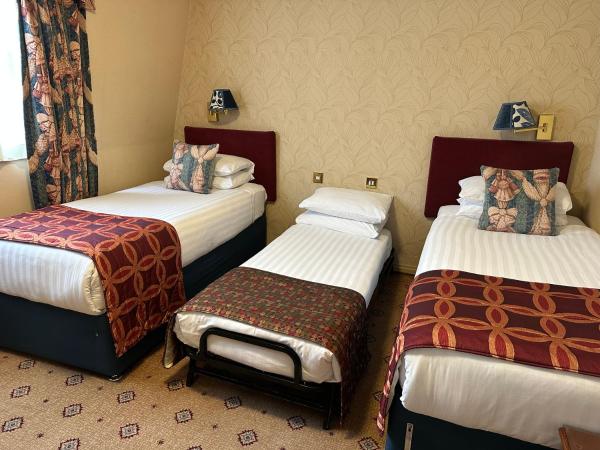 London Lodge Hotel : photo 9 de la chambre chambre lits jumeaux standard