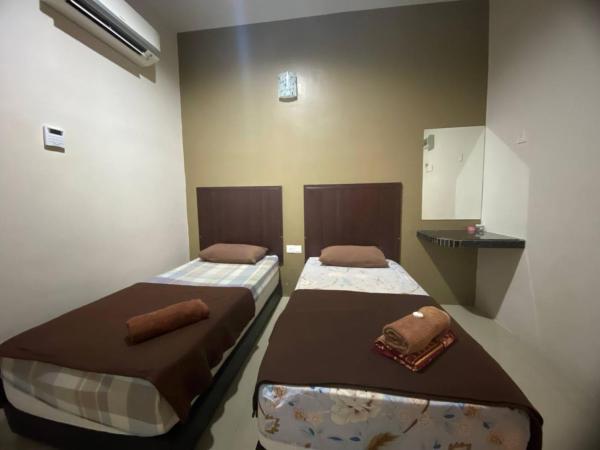 TGL Aparthotel Tanjung Lumpur : photo 2 de la chambre chambre lits jumeaux standard
