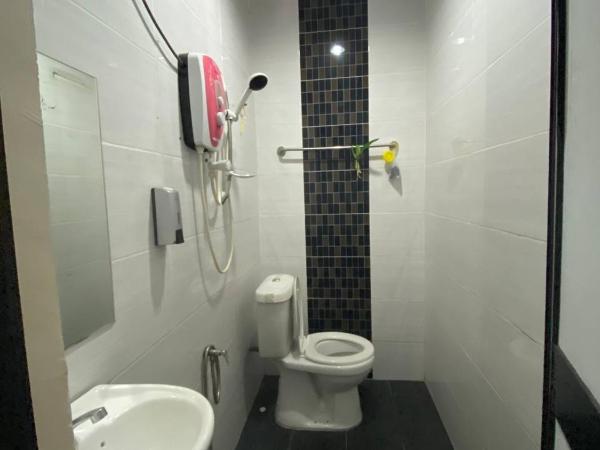 TGL Aparthotel Tanjung Lumpur : photo 4 de la chambre chambre lits jumeaux standard