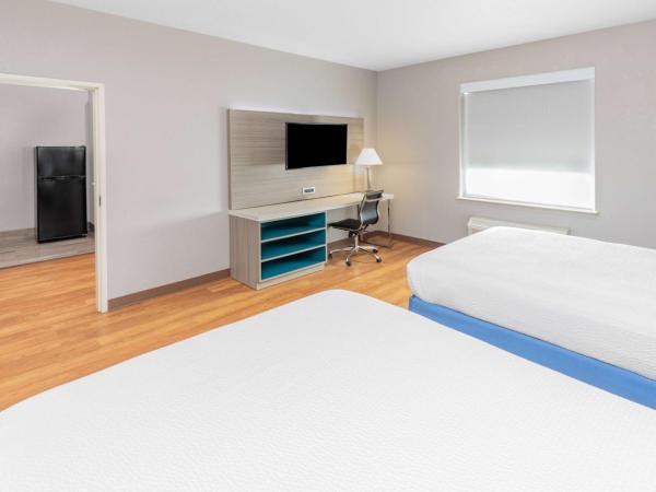 Days Inn & Suites by Wyndham San Antonio near Frost Bank Center : photo 2 de la chambre suite 2 chambres - non-fumeurs