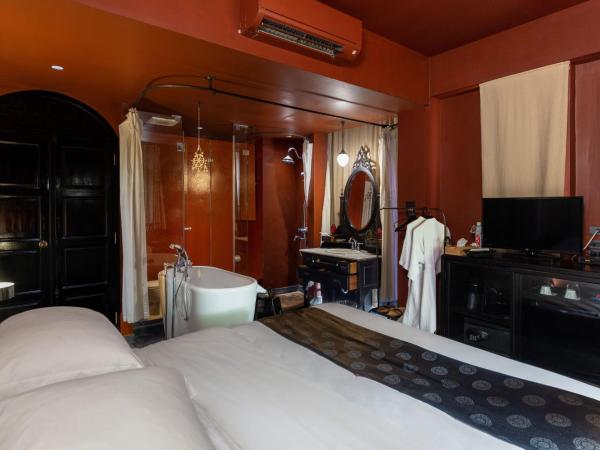 Amdaeng Bangkok Riverside Hotel : photo 1 de la chambre chambre deluxe