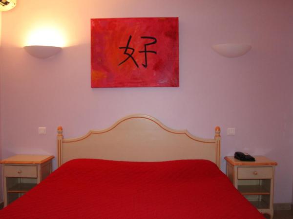 Hôtel Les Palmiers : photo 1 de la chambre chambre double confort