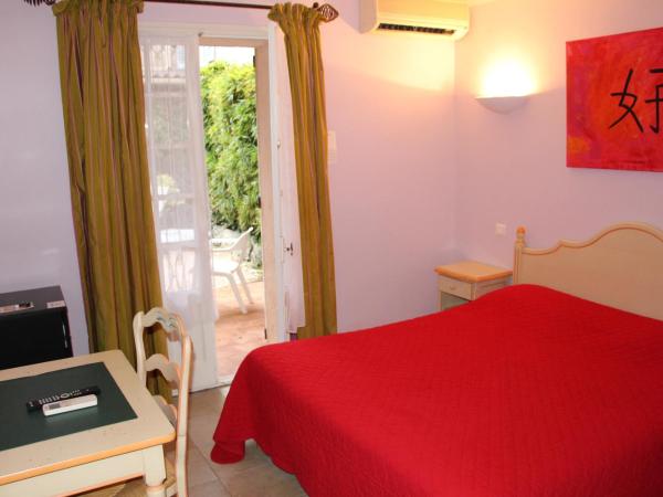 Hôtel Les Palmiers : photo 2 de la chambre chambre double confort