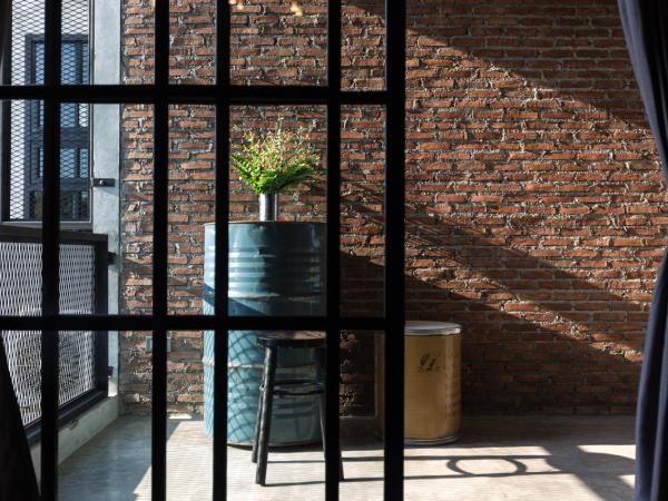 Rumpai Loft Habitat : photo 4 de la chambre chambre double avec salle de bains privative