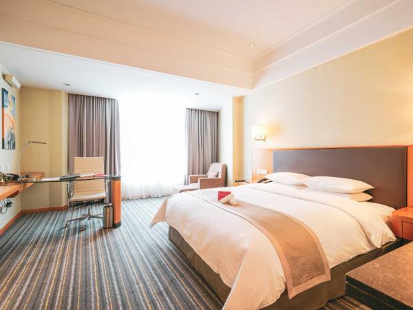 Ramada Plaza Shanghai Pudong Airport - A journey starts at the PVG Airport : photo 1 de la chambre chambre lit king-size deluxe - non-fumeurs 