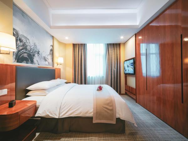 Ramada Plaza Shanghai Pudong Airport - A journey starts at the PVG Airport : photo 2 de la chambre suite lit king-size – non-fumeurs