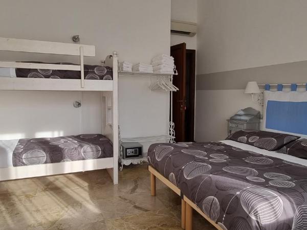 Stay Bergamo : photo 2 de la chambre chambre quadruple avec salle de bains privative séparée