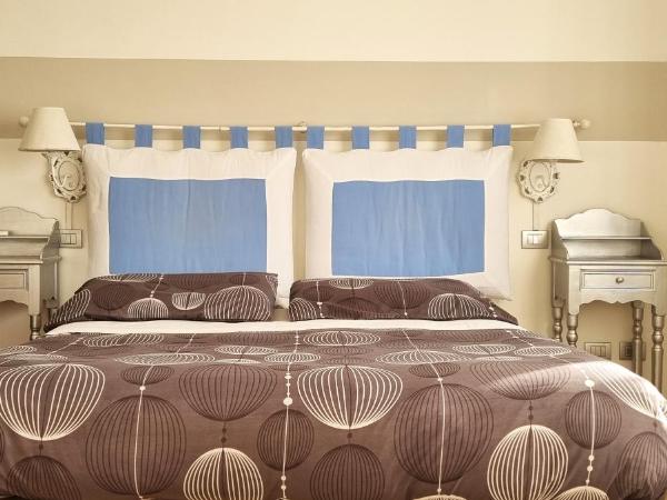 Stay Bergamo : photo 4 de la chambre chambre quadruple avec salle de bains privative séparée