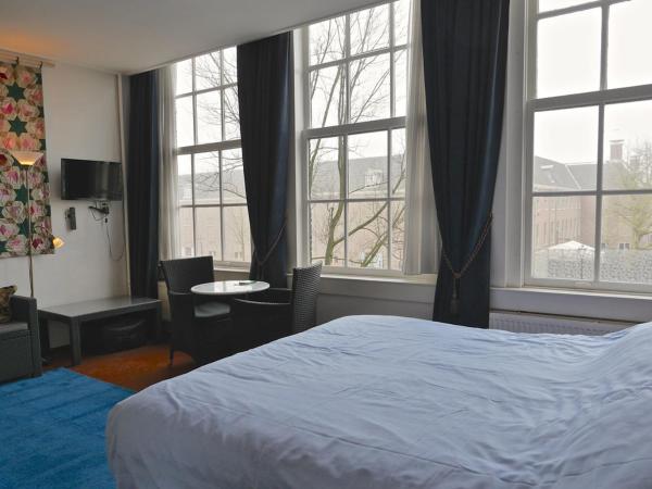 Hotel Adolesce : photo 7 de la chambre chambre double ou lits jumeaux avec salle de bains privative
