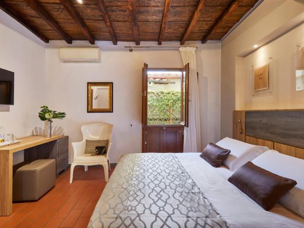 Sette Angeli Rooms : photo 10 de la chambre chambre double avec patio