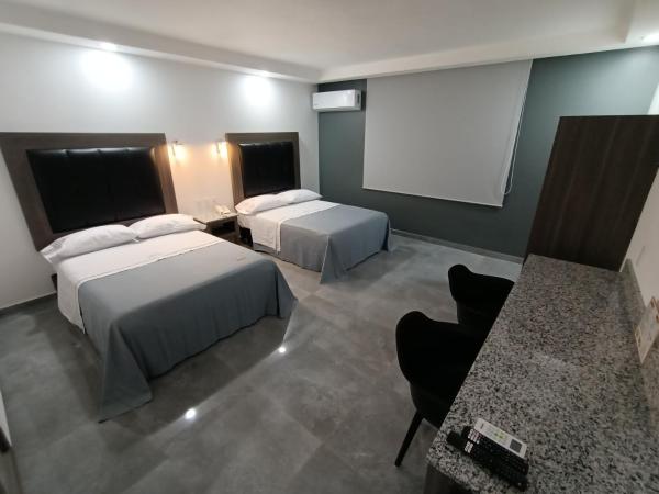 Hotel y Villas Costa del Sol : photo 1 de la chambre chambre double avec 2 lits doubles