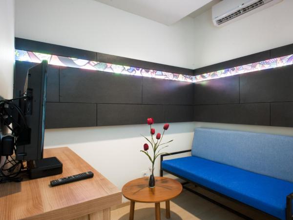 MaxOneHotels at Dharmahusada Surabaya : photo 2 de la chambre happiness double or twin room