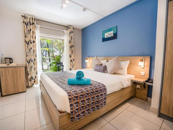 Le Grand Bleu Hotel : photo 1 de la chambre chambre deluxe