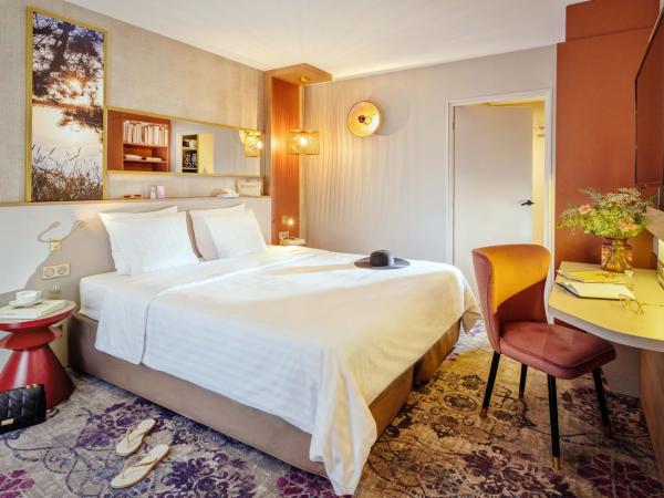 Hôtel Valdys Thalasso & Spa - Beau rivage : photo 3 de la chambre chambre double confort - vue latérale sur mer