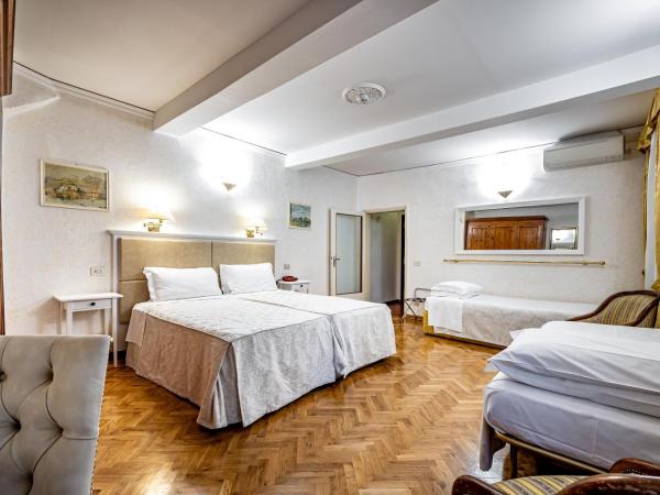 Hotel Alessandra : photo 5 de la chambre chambre quadruple