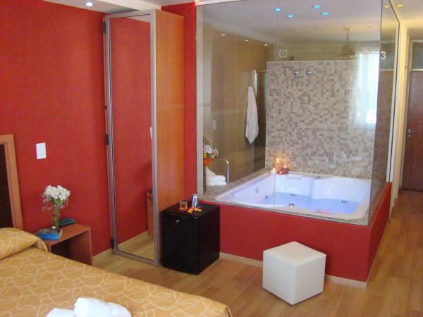Hotel Necof : photo 4 de la chambre chambre lit queen-size avec baignoire spa