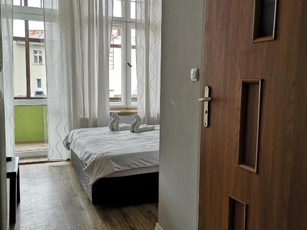 Central Sopot : photo 2 de la chambre chambre lit queen-size avec balcon